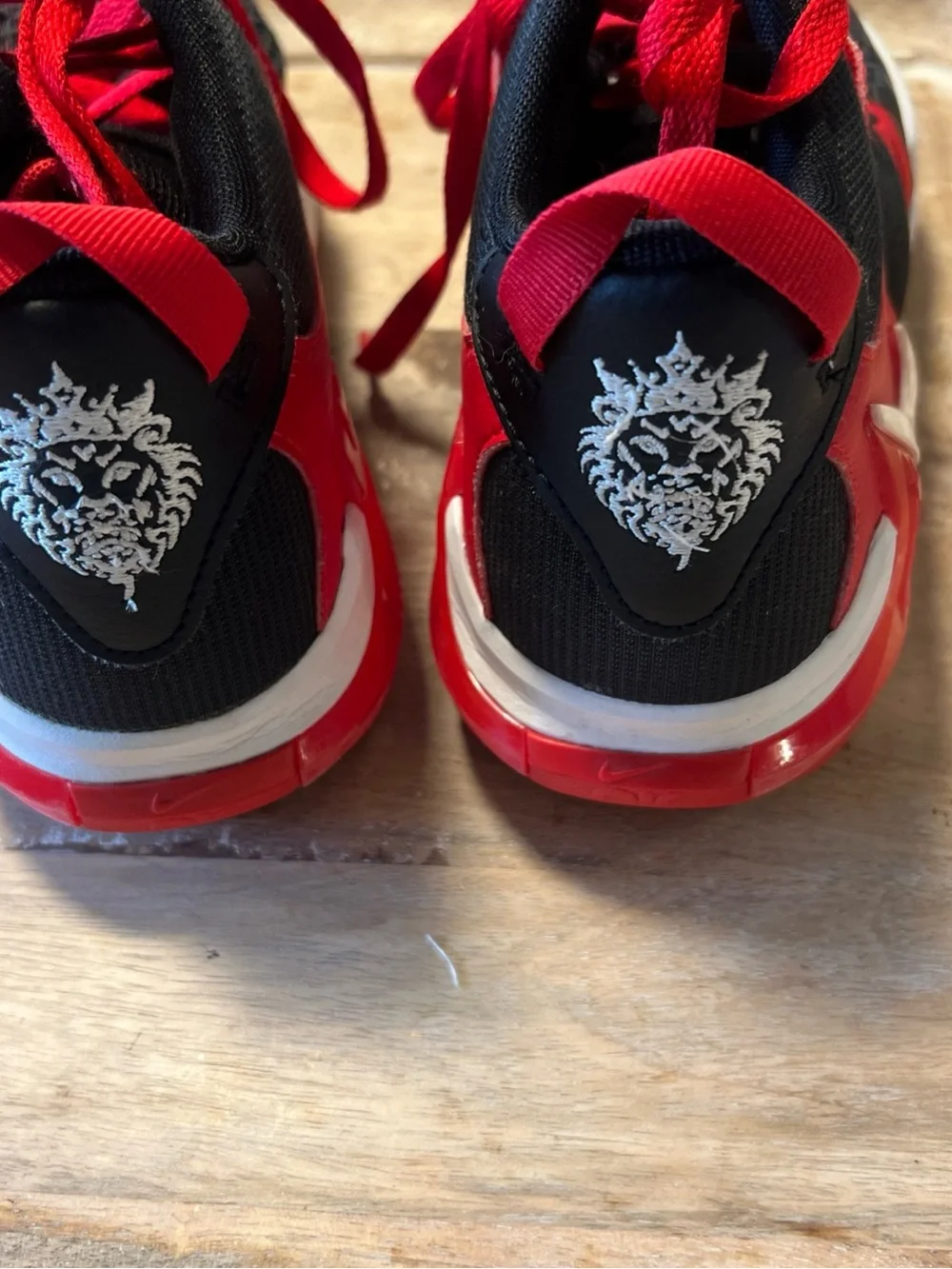 Nike Kids Black and Red Athletic Sneakers with White Swoosh (LeBron witness 7 )